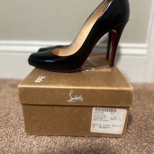 Christian Louboutin Black Patent Pumps with Signature Red Sole